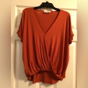 Burnt orange cross body top